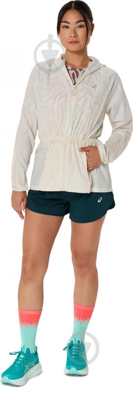Куртка жіноча Asics ROAD PACKABLE JACKET 2012D076-200 р.M молочна - фото 9 Куртка жіноча Asics ROAD PACKABLE JACKET 2012D076-200 р.M молочна - фото 9
