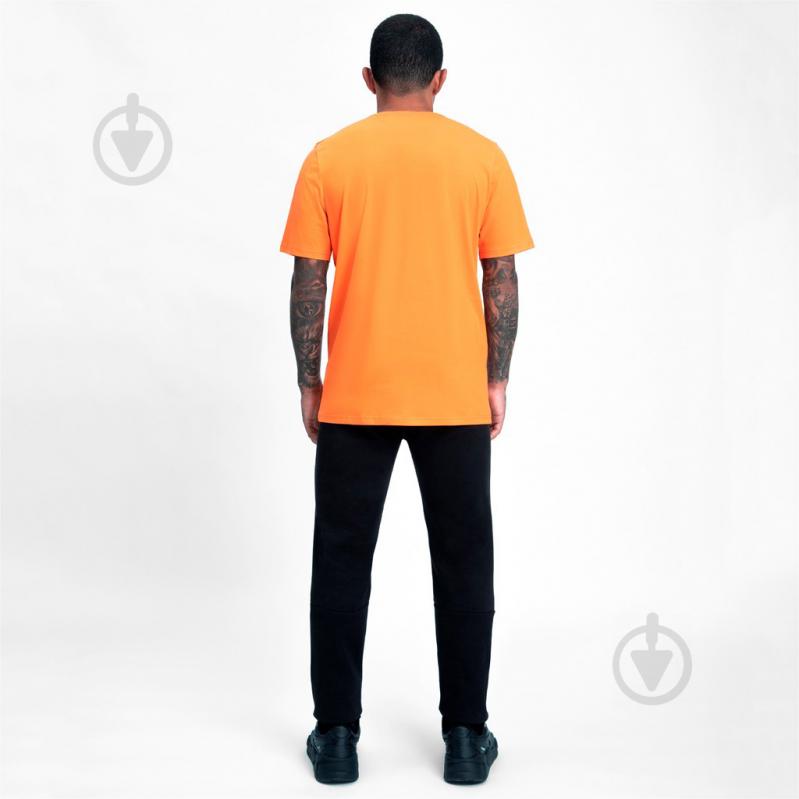 Футболка Puma FCSD FtblCore Wording Tee 76412201 р.2XL оранжевый - фото 6