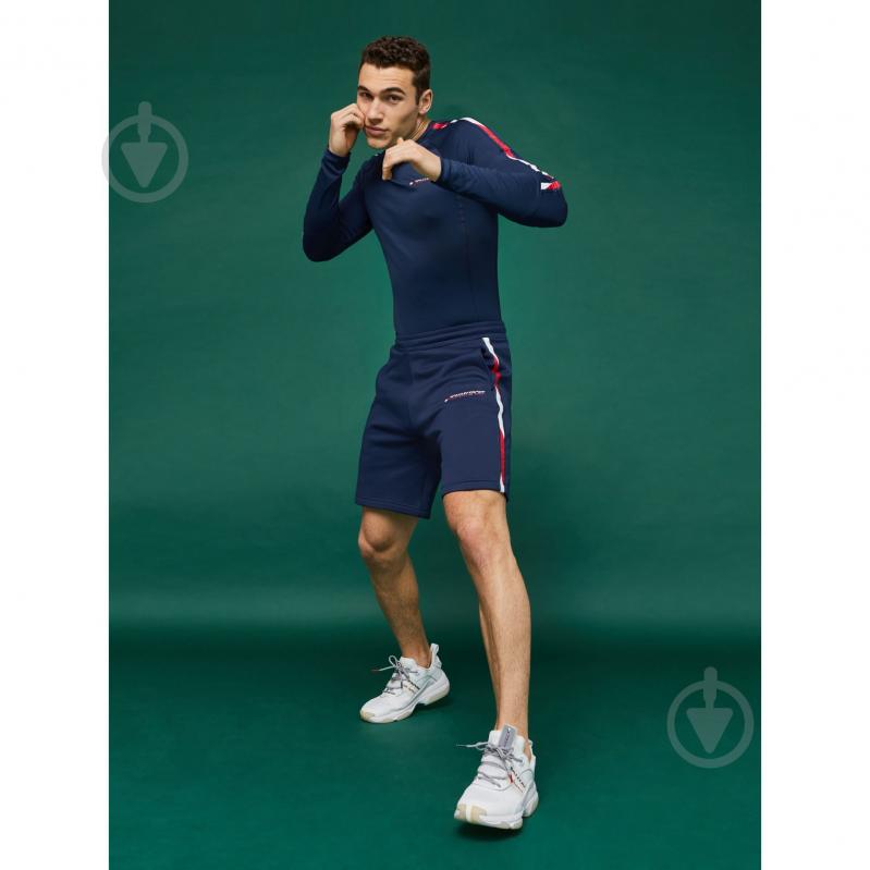 Шорти Tommy Hilfiger FLEECE SHORTS WITH TAPE 9" S20S200214401 р. M темно-синій - фото 4