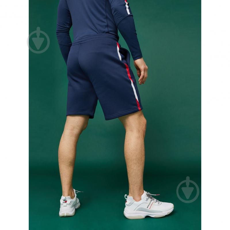 Шорты Tommy Hilfiger FLEECE SHORTS WITH TAPE 9" S20S200214401 р. S темно-синий - фото 2 Шорты Tommy Hilfiger FLEECE SHORTS WITH TAPE 9" S20S200214401 р. S темно-синий - фото 2