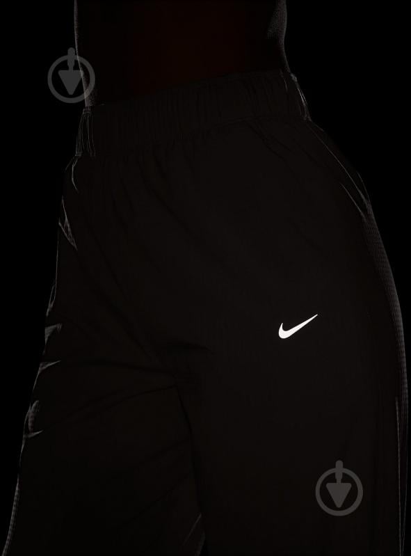 Штани Nike W NK FAST DF WRM MR 7/8 PNT FB7730-214 р. XS коричневий - фото 9