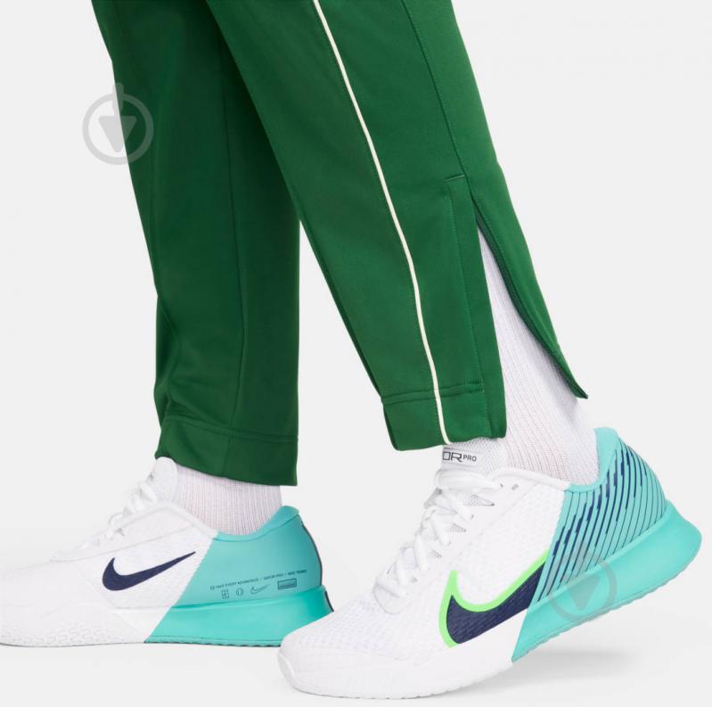 Штани Nike M NKCT HERITAGE SUIT PANT DC0621-341 р. S зелений - фото 6