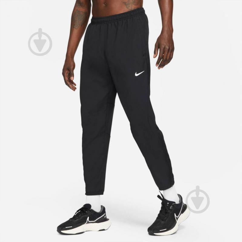 Штани Nike M NK DF CHLLGR WVN PANT DD4894-010 р. L чорний - фото 1