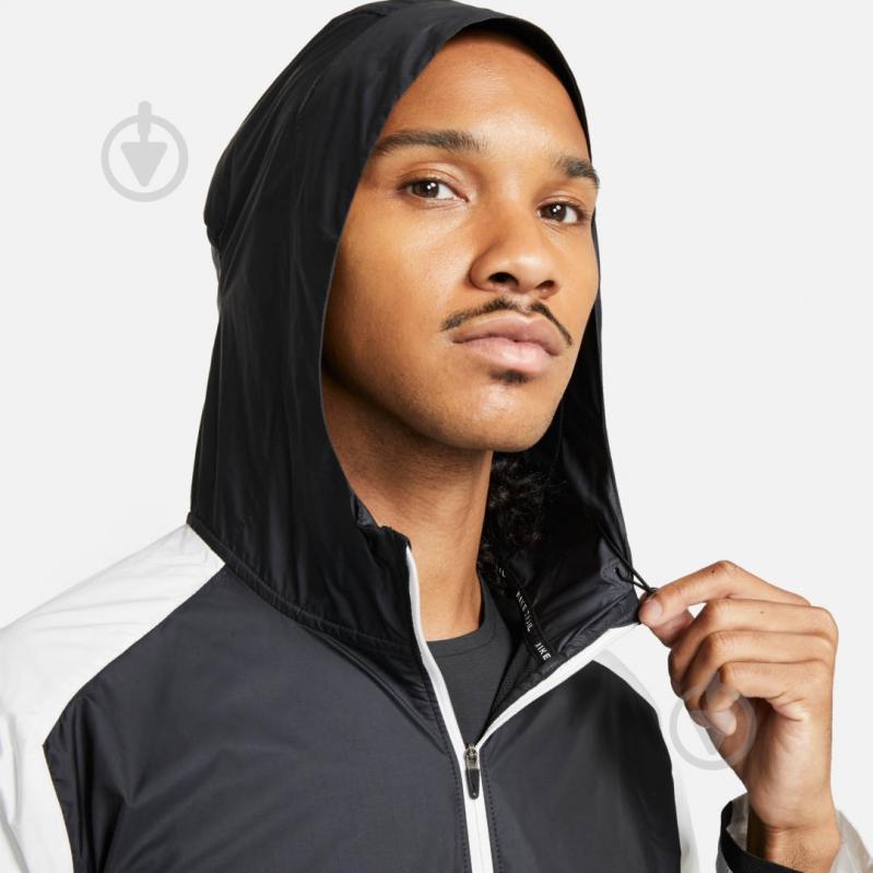 Вітрівка чоловіча весняна Nike M NK SF TRAIL WINDRUNNER JKT CZ9054-010 р.L чорно-сіра - фото 4 Вітрівка чоловіча весняна Nike M NK SF TRAIL WINDRUNNER JKT CZ9054-010 р.L чорно-сіра - фото 4
