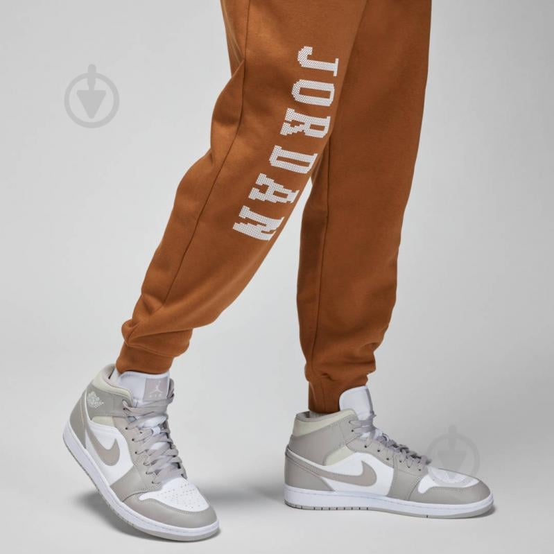 Штани Jordan M J ESS MMBR HLDY FLC PANT FD7467-281 р. M бежевий - фото 8