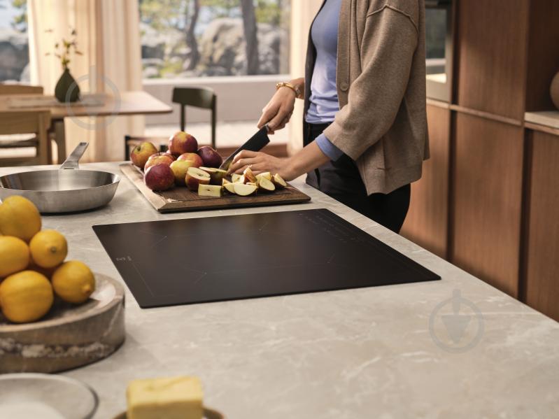 Варочная поверхность индукционная Electrolux EIT60433CT - фото 5