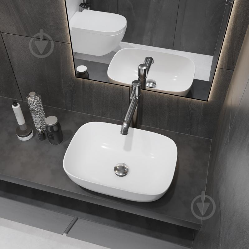 Умывальник Helmken 49346000 3 в 1: прямоугольный 46 см, с сифоном и донным клапаном Сlick-clack, черный матовый - фото 9 Умывальник Helmken 49346000 3 в 1: прямоугольный 46 см, с сифоном и донным клапаном Сlick-clack, черный матовый - фото 9