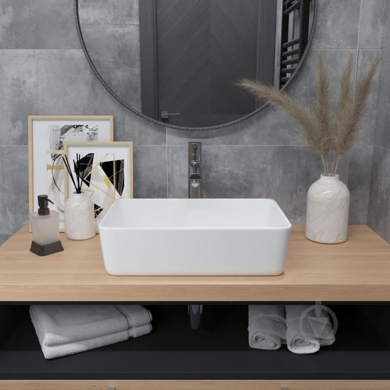 Умывальник Helmken 67448000 3 в 1: прямоугольный 48 см, с сифоном и донным клапаном Сlick-clack, хром - фото 12 Умывальник Helmken 67448000 3 в 1: прямоугольный 48 см, с сифоном и донным клапаном Сlick-clack, хром - фото 12