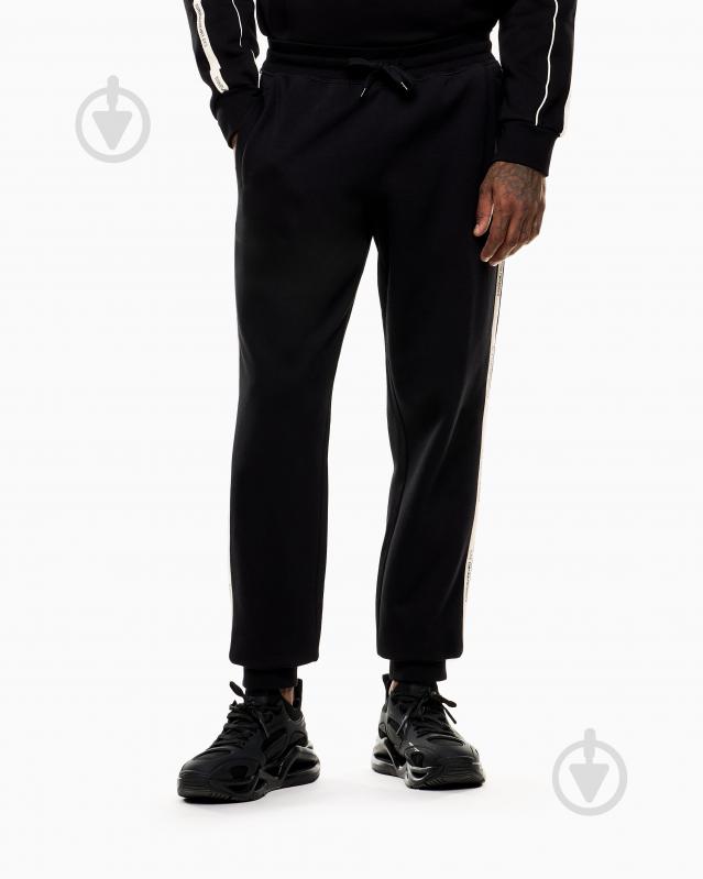 Штани EA7 LOGO SERIES M TAPE PANTS CH BR 7M000974-AF10377-UC001 р. S чорний - фото 1 Штани EA7 LOGO SERIES M TAPE PANTS CH BR 7M000974-AF10377-UC001 р. S чорний - фото 1