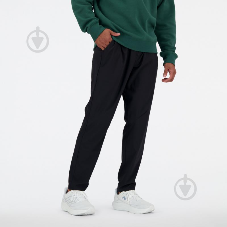 Штани New Balance AC STRETCH WOVEN TAPERED PANT MP41060BK р. S чорний - фото 2