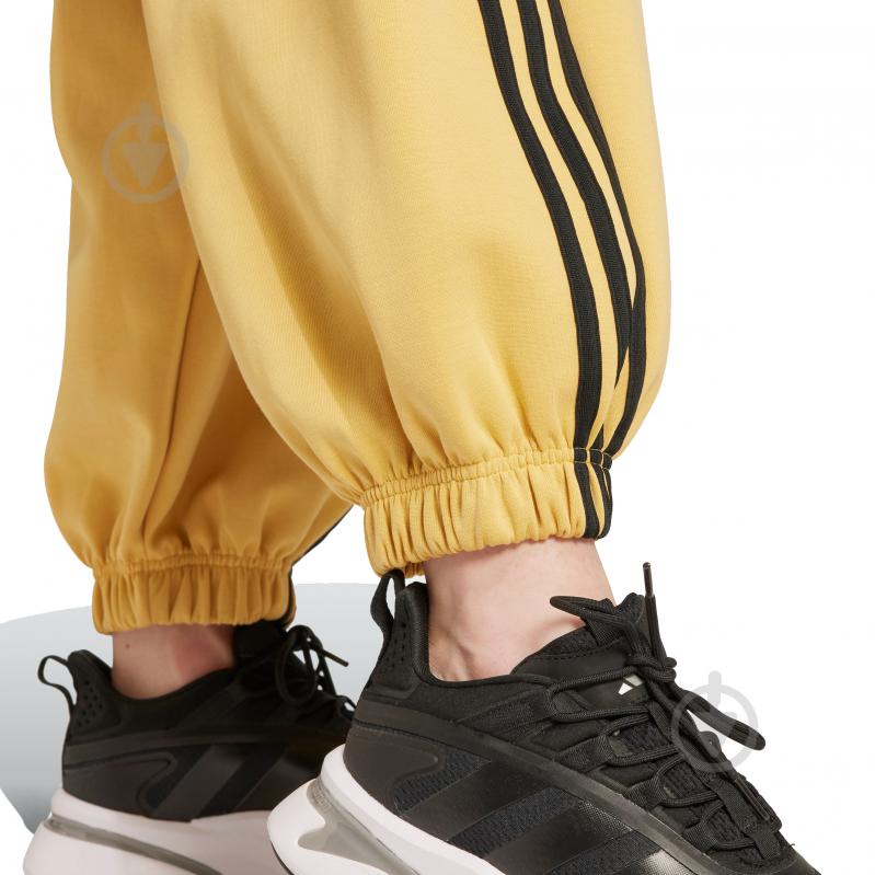 Брюки Adidas W FI 3S PARA PT JE8240 р. M желтый - фото 4