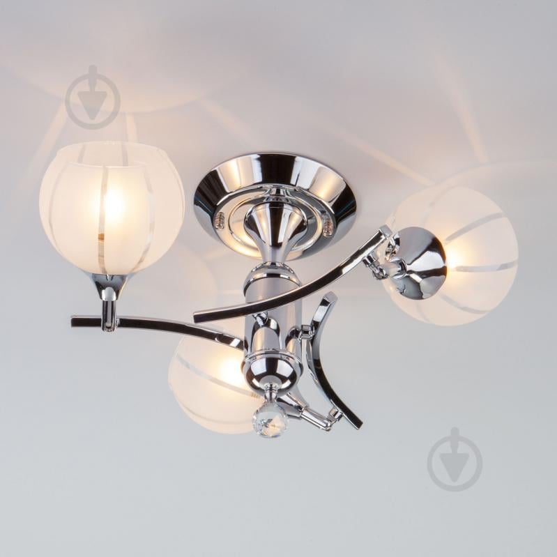 Люстра потолочная Євросвітло Strotskis Libre 3353/3 3x60 Вт E27 хром - фото 1