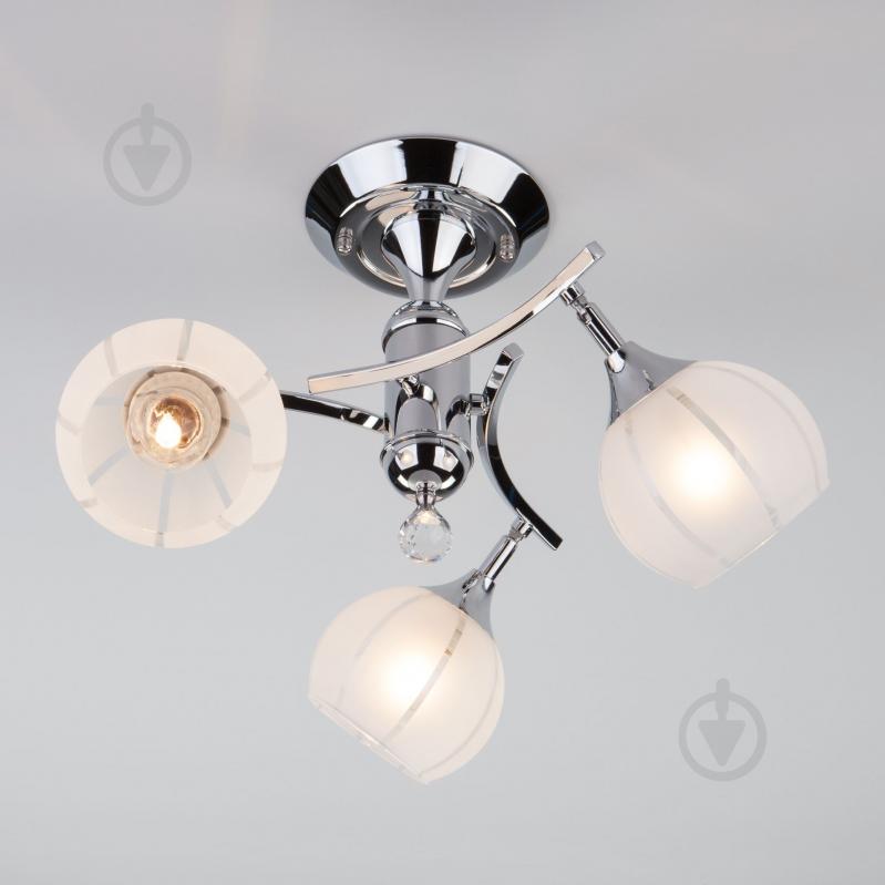 Люстра потолочная Євросвітло Strotskis Libre 3353/3 3x60 Вт E27 хром - фото 4