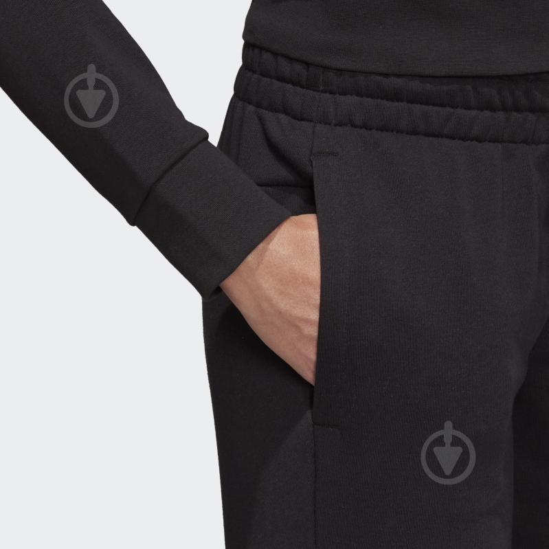 Брюки Adidas W E PLN PANT DP2400 р. M черный - фото 5 Брюки Adidas W E PLN PANT DP2400 р. M черный - фото 5