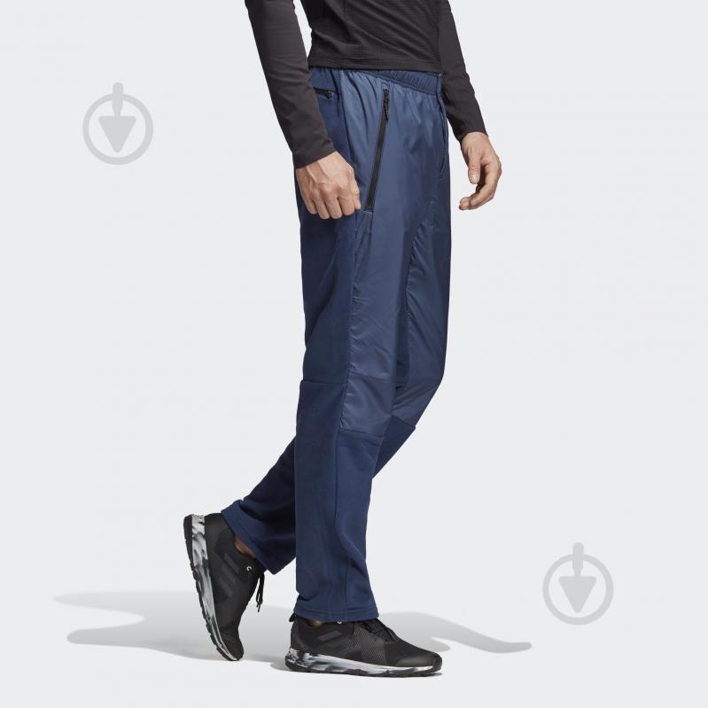 Брюки Adidas Windfleece P EH6500 р. L/L темно-синий - фото 4