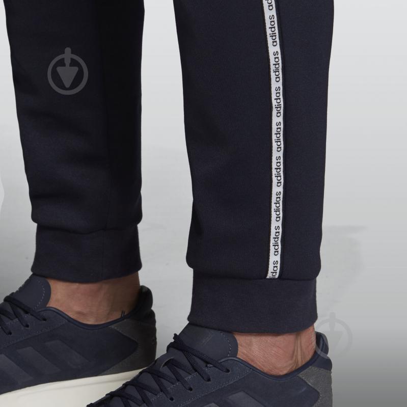 Брюки Adidas M C90 TP EJ9675 р. M темно-синий - фото 6 Брюки Adidas M C90 TP EJ9675 р. M темно-синий - фото 6