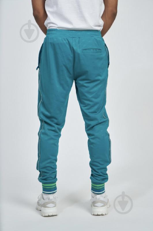 Брюки Umbro MONOGRAM TRACK PANT 66391U-MAP р. M зеленый - фото 4