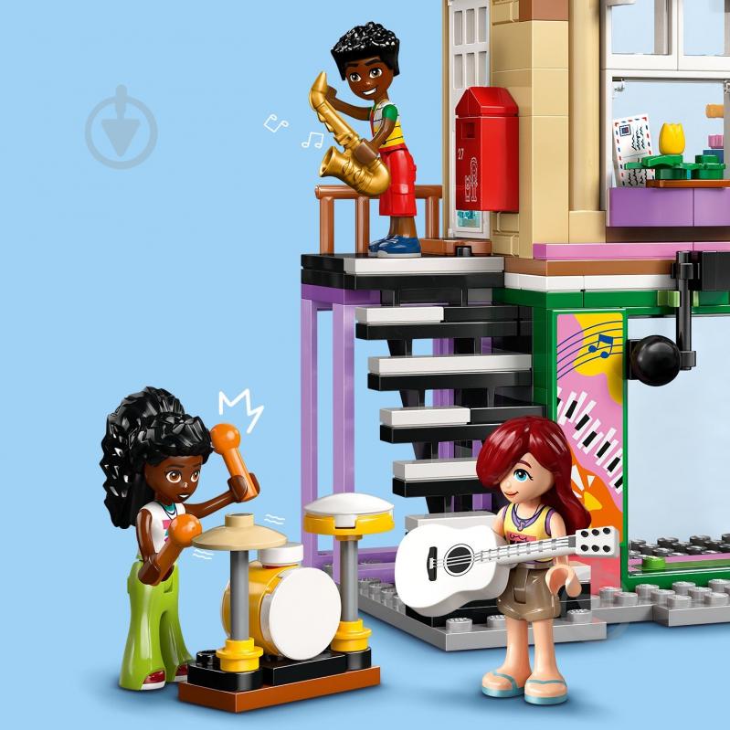 Конструктор LEGO Friends Музична крамниця і квартира 42653 - фото 9