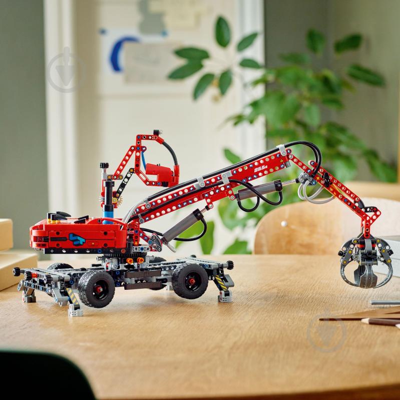 Конструктор LEGO Technic Погрузчик 42144 - фото 7
