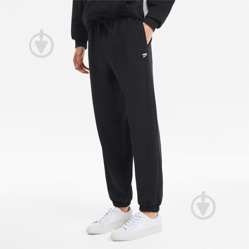 Брюки Puma Downtown Sweat Pants 59637101 р. L черный - фото 1 Брюки Puma Downtown Sweat Pants 59637101 р. L черный - фото 1