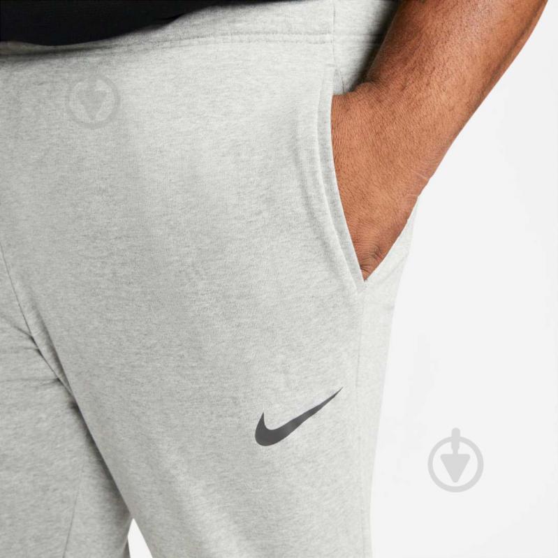 Брюки Nike DF PNT TAPER FL CZ6379-063 р. 2XL серый - фото 10