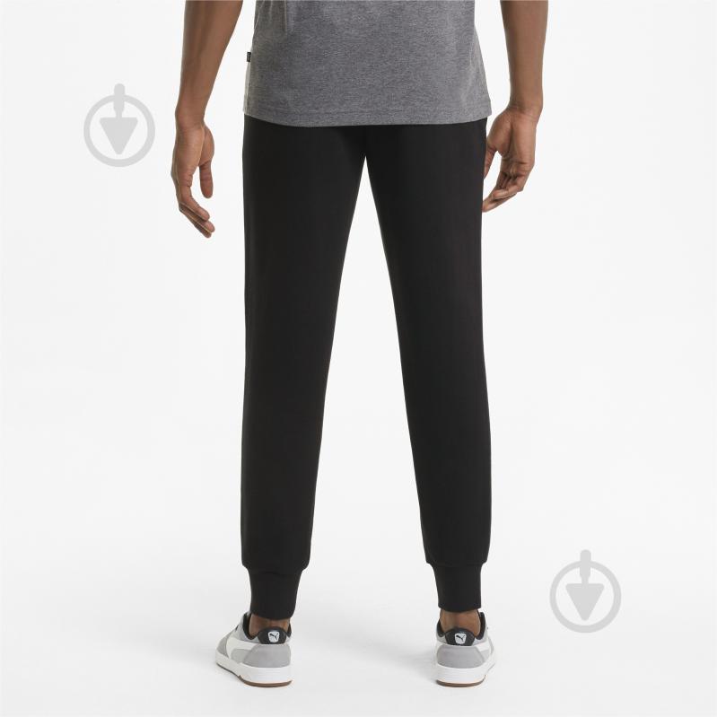 Puma ess logo on sale pants