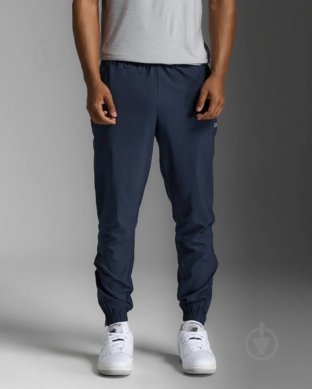 Штани 2XU Aero Woven Jogger MR7210b_MDN/SRF р. S синій - фото 1 Штани 2XU Aero Woven Jogger MR7210b_MDN/SRF р. S синій - фото 1