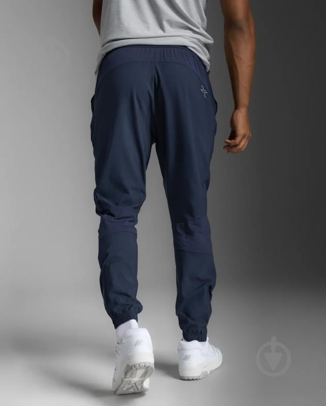 Штани 2XU Aero Woven Jogger MR7210b_MDN/SRF р. S синій - фото 2