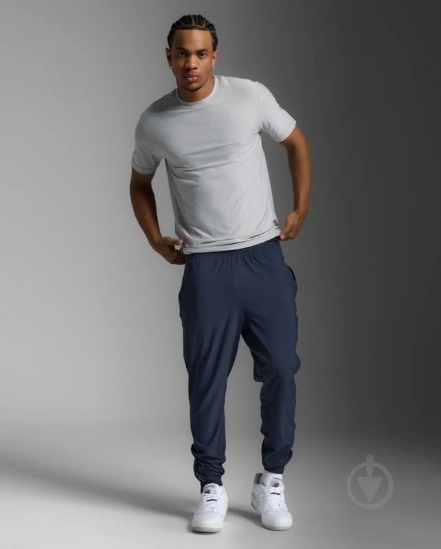 Штани 2XU Aero Woven Jogger MR7210b_MDN/SRF р. S синій - фото 7