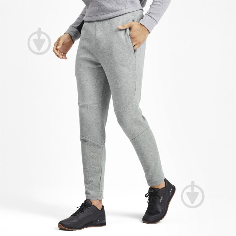 Брюки Puma EVOSTRIPE Pants 58010303 р. S серый - фото 1 Брюки Puma EVOSTRIPE Pants 58010303 р. S серый - фото 1
