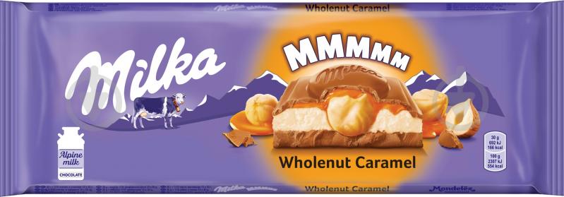 Шоколад Milka з цілими горіхами та карамеллю 300г - фото 1
