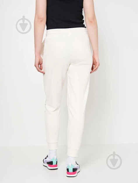 Брюки Puma TAPE PANTS TR W CL FROSTY WHITE 67132853 р. L белый - фото 2