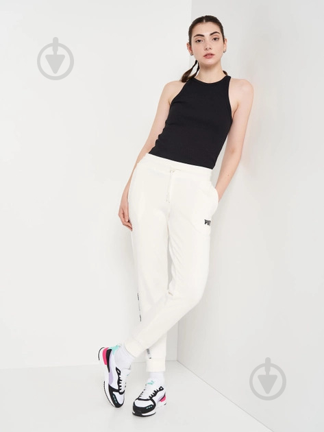 Брюки Puma TAPE PANTS TR W CL FROSTY WHITE 67132853 р. L белый - фото 5