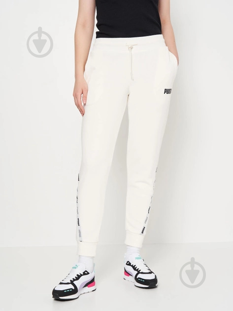 Брюки Puma TAPE PANTS TR W CL FROSTY WHITE 67132853 р. L белый - фото 1