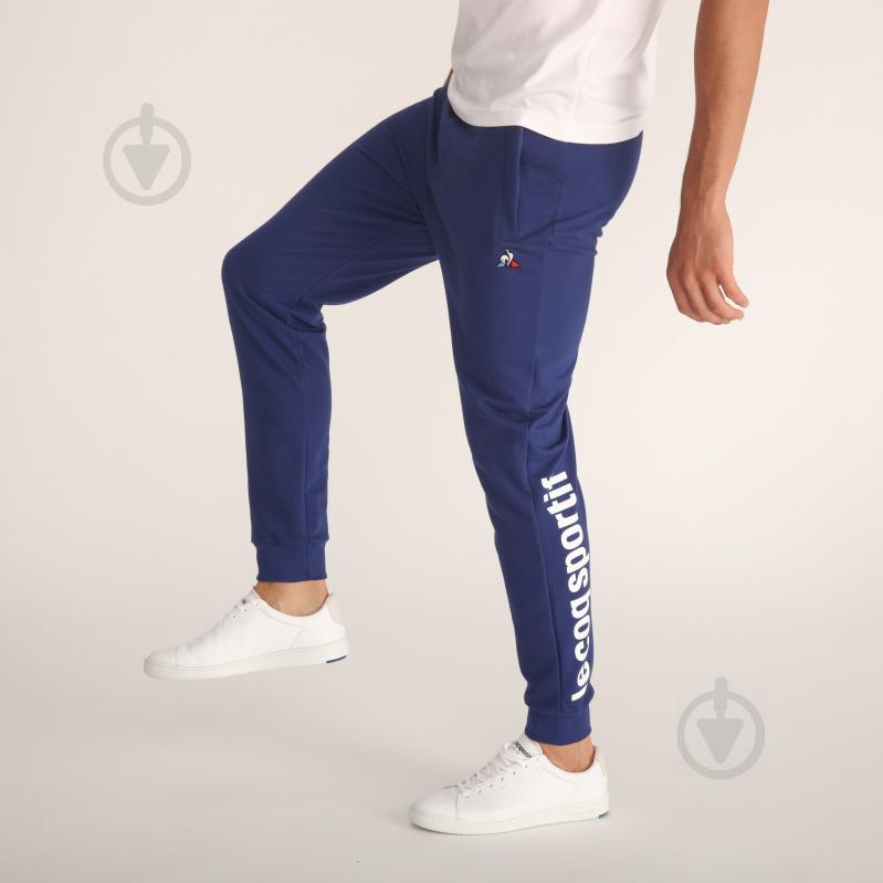 Брюки Le Coq Sportif ESS SAISON PANT SLIM N1 1921041-LCS р. S синий - фото 3