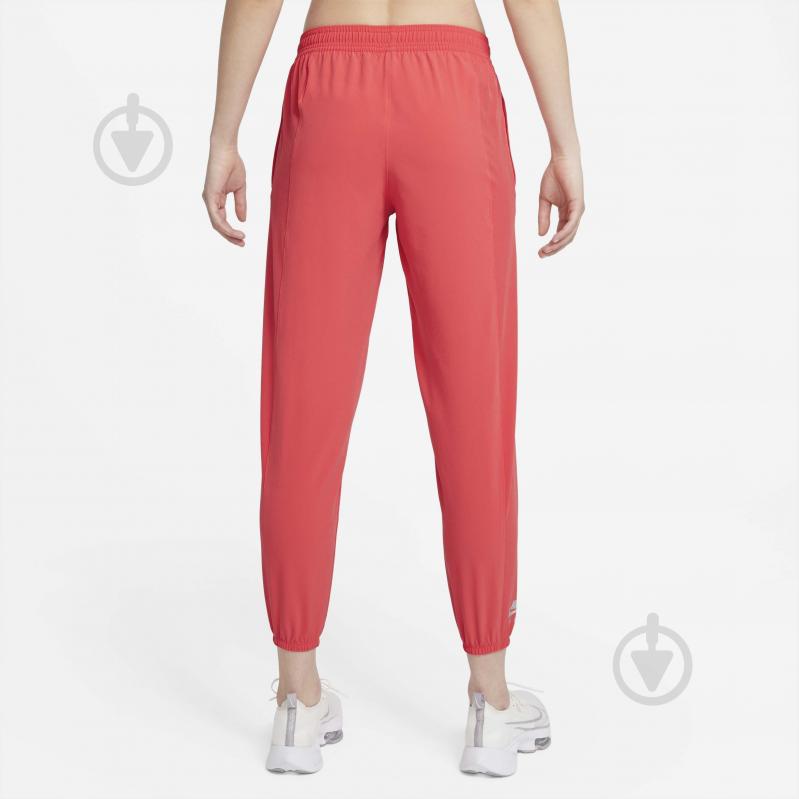 Штани Nike W NK AIR DF PANT 7/8 DD4145-814 р. XS рожевий - фото 2