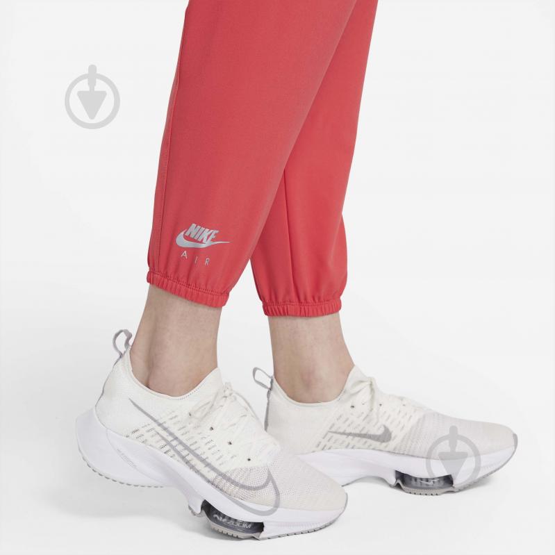 Штани Nike W NK AIR DF PANT 7/8 DD4145-814 р. XS рожевий - фото 6