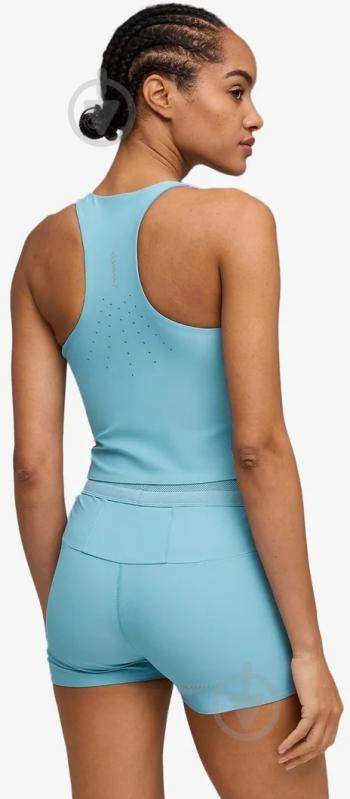 Топ Puma LIGHTSPEED CROP TOP 52850046 р.S голубой - фото 3 Топ Puma LIGHTSPEED CROP TOP 52850046 р.S голубой - фото 3