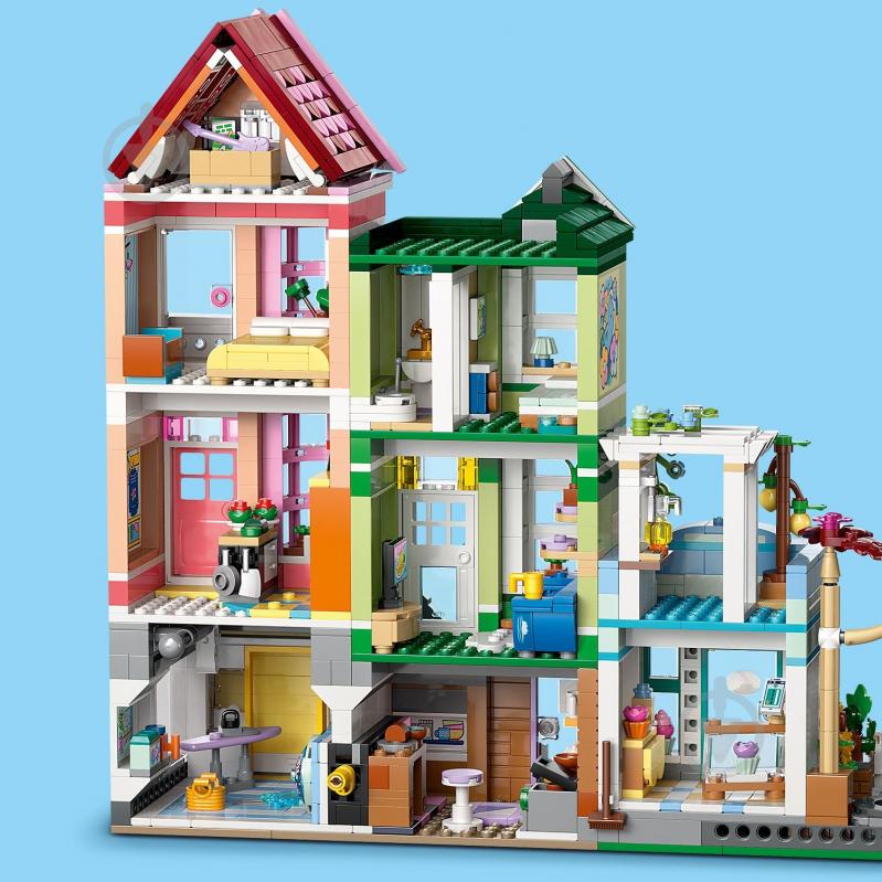 Конструктор LEGO Friends Хартлейк-Сіті. Квартири і крамниці 42670 - фото 15