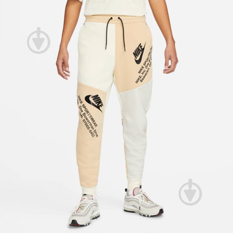 Брюки Nike DM6480-252 р. XL бежевый - фото 1 Брюки Nike DM6480-252 р. XL бежевый - фото 1