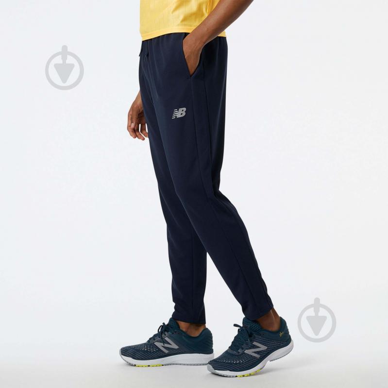 Штани New Balance NB TECH TRAINING KNIT TRACK MP21033ECL р. XXL синій - фото 2