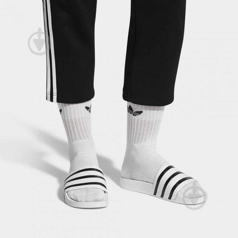 Шлепанцы Adidas ADILETTE 280648 р.48 2/3 белый - фото 10 Шлепанцы Adidas ADILETTE 280648 р.48 2/3 белый - фото 10