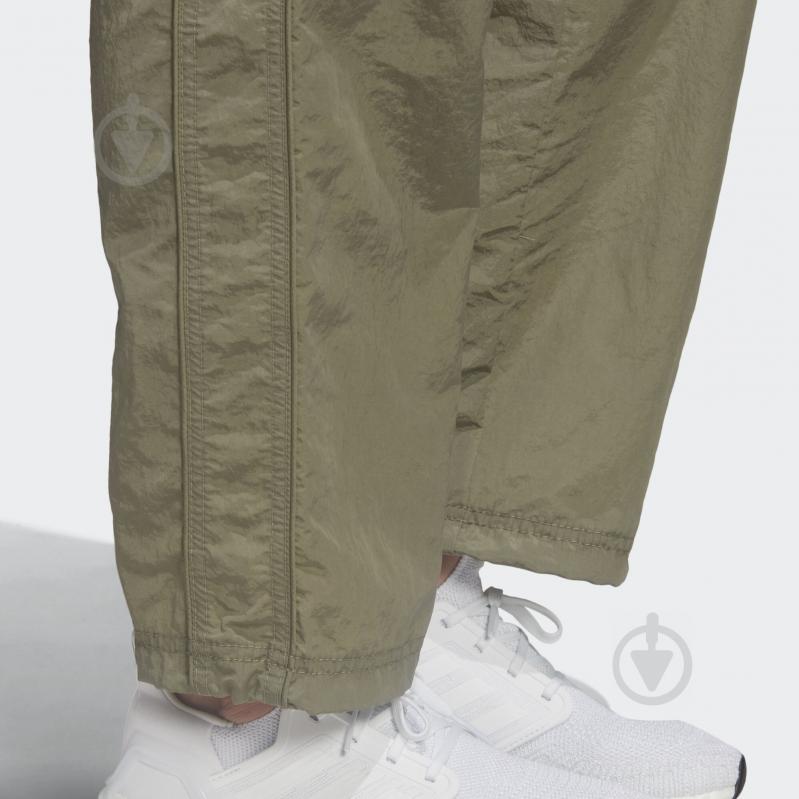 Штани Adidas W woven pant FI6718 р. XS зелений - фото 8