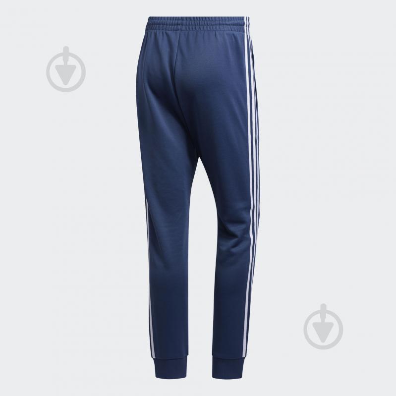Брюки Adidas SST TP FM3807 р. M синий - фото 2