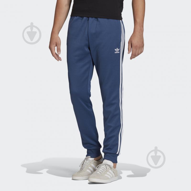 Брюки Adidas SST TP FM3807 р. M синий - фото 3