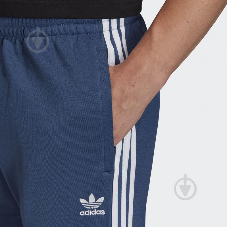 Брюки Adidas SST TP FM3807 р. M синий - фото 7