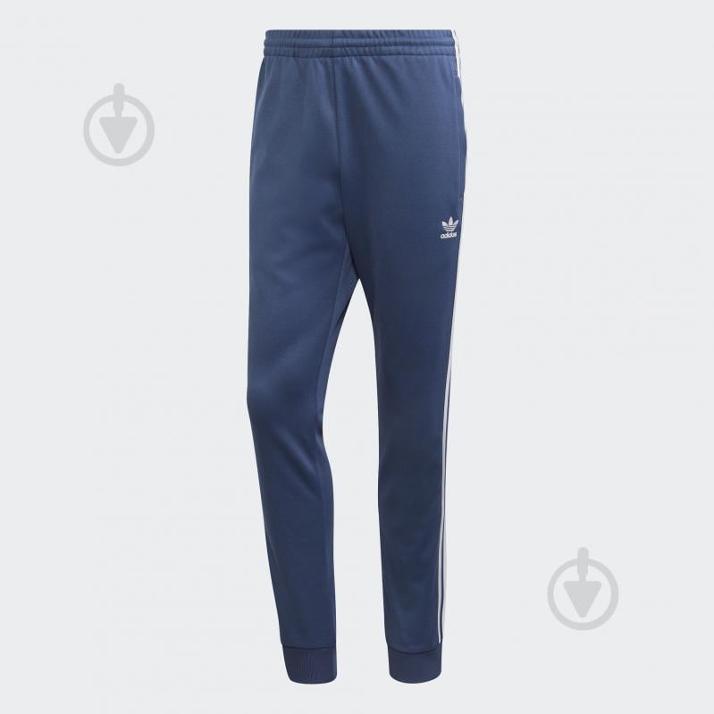 Брюки Adidas SST TP FM3807 р. 2XL синий - фото 1