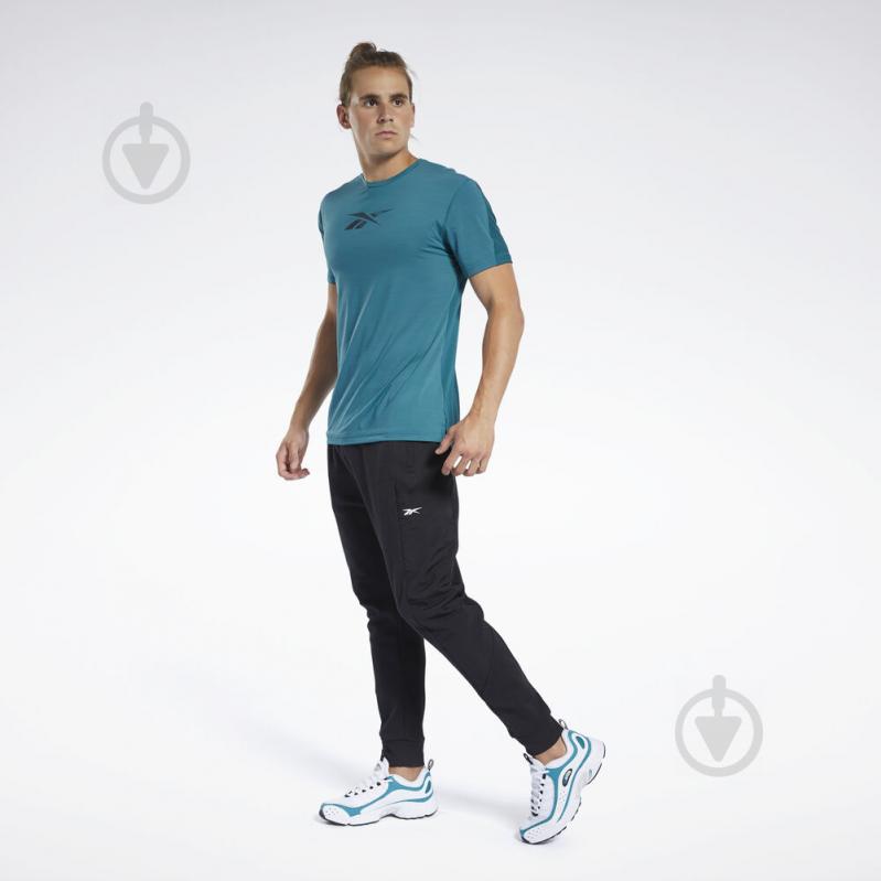 Футболка Reebok TS AC Graphic Move HERTEA FJ4625 S бирюзовый - фото 2