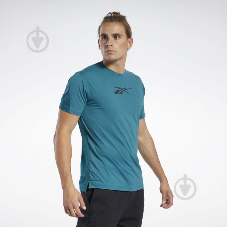 Футболка Reebok TS AC Graphic Move HERTEA FJ4625 р.L бирюзовый - фото 1