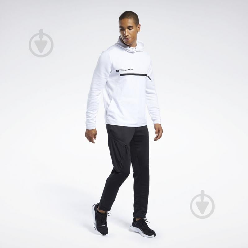 Брюки Reebok TS Layering Pant FJ4630 р. S черный - фото 2